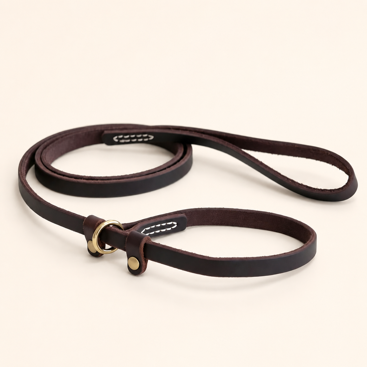 Dark chocolate leather slip lead arranged to show its handle loop and adjustable collar loop