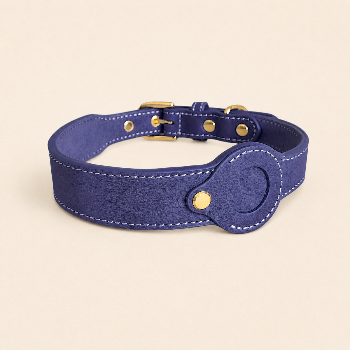 purple dog collar showing the removable leather AirTag holder without an AirTag installed